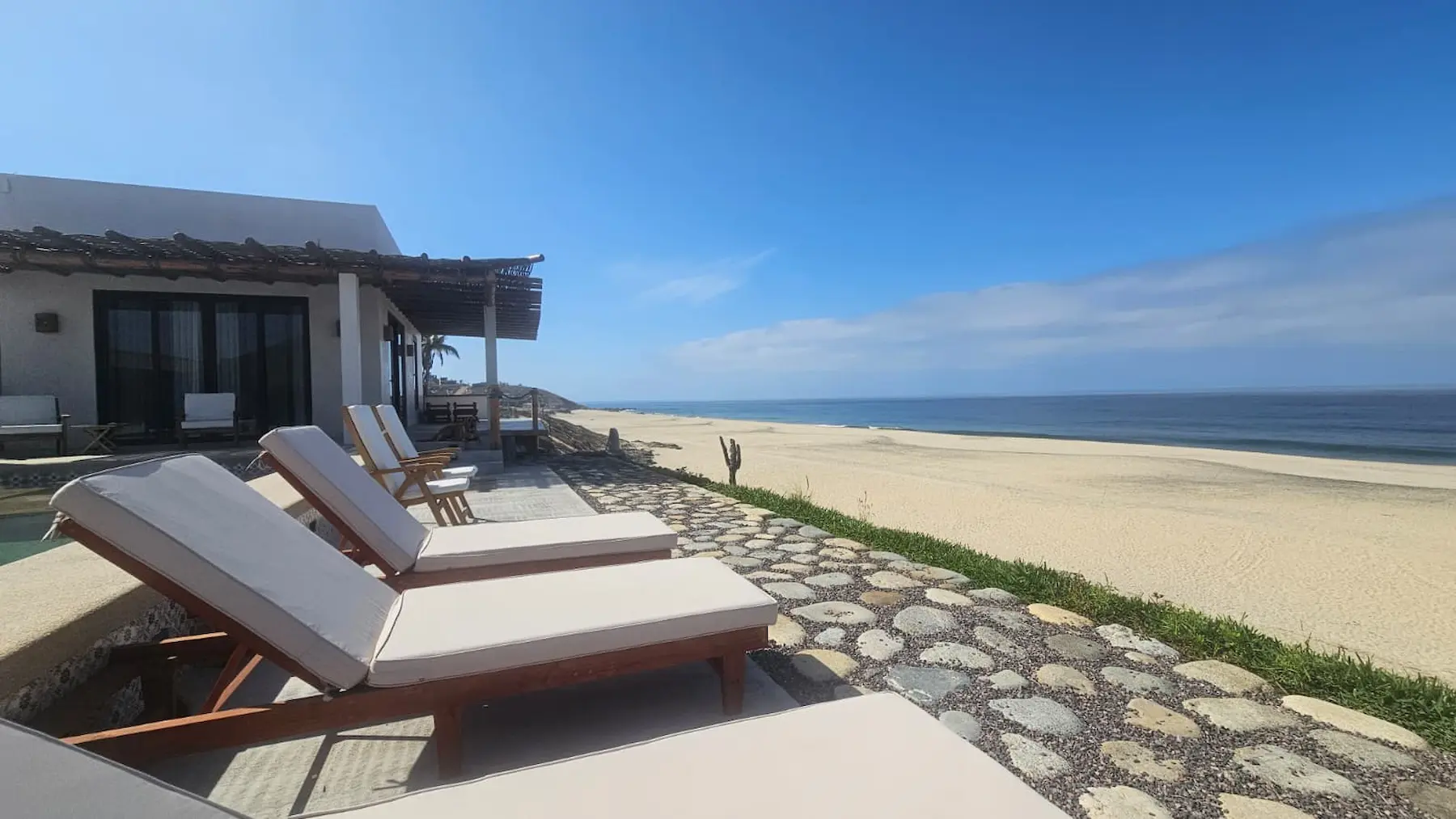 Casa Del Perro resort buildings facing the ocean