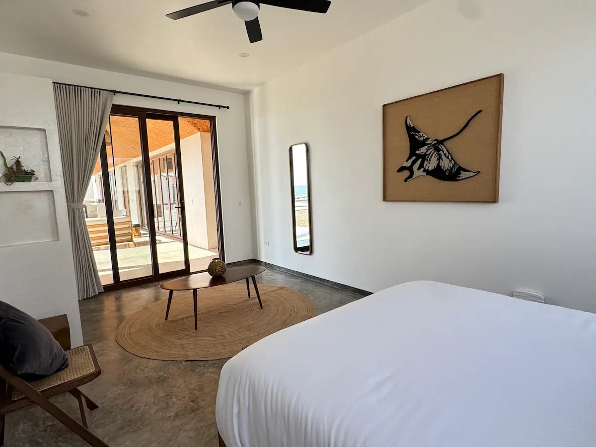 Standard suite bedroom with coastal decor